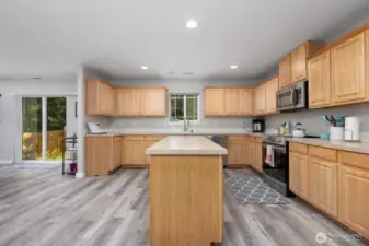 Functional layout and abundant cabinetry give this kitchen a seamless blend of storage and workspace.