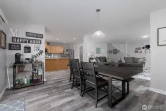The kitchen overlooks both the dining and living areas, allowing for connection while cooking or entertaining guests.