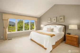 Tranquil main floor primary suite with views.