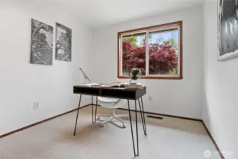 3rd upstairs bedroom is staged as an office with storage closet.