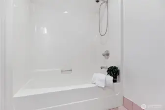 Enjoy the spacious upstairs bathroom, offering both convenience and a relaxing tub.