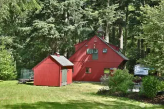 The Carriage House! Lower level Workshop and Upper level Guest Suite "The Hayloft" on Airbnb. Check out the fabulous reviews about the guest space. Custom made windows in the barn/carriage house.