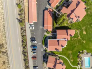 2 dedicated parking Spots one Carport and one open.