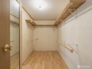 A large walk-in closet completes the suite, providing ample storage and organization.