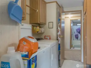 The utility room is designed - whether you're dropping off muddy boots, unloading groceries, or multitasking between chores.