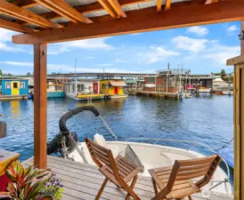 Lower back deck offers covered seating, storage and a BBQ area. And most of all - easy access to your kayak, paddle board, or Boston Whaler (also available for sale).
