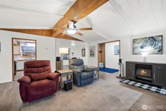 Living room toward dining area and kitchen
