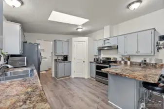 Large, open kitchen with skylights for natural light