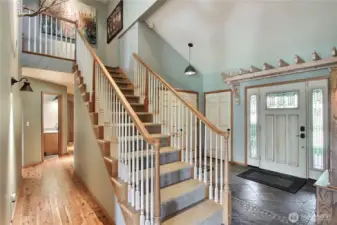 As you enter, you will find the slate entry and dramatic 2-story foyer. The staircase leads up to your Primary Suite, and I love the double coat closet plus additional closet for storage, or more coats!