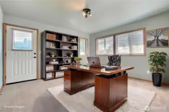 Main floor office/den, has it's own exterior door that leads to side yard/shop/carport. We used it as a bedroom. ***Virtually Staged***