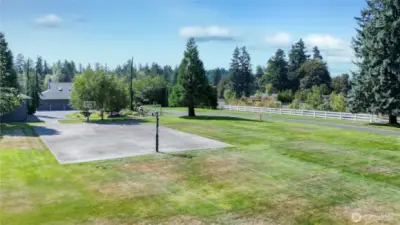 Drone view of your full sport court with basketball hoops. So much room to play!