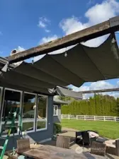 Pic showing one of the 2 patio sun shades out. Fully adjustable.