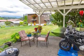 There's a lovely patio out the living room door to enjoy coffee on warm summer morning!