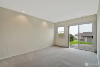 Primary Bdrm with Slider to Patio & View of Sound