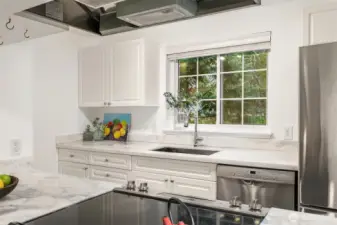 Stainless appliances including microwave.