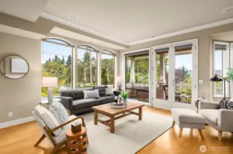 This end unit gets fabulous light all day from the bank of south and west facing windows.