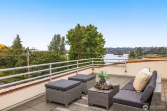 Enjoy the private rooftop deck and view of Green Lake