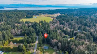 Aerial view looking past Skagit Bay toward the Cascade Mountains.