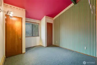 Second bedroom upstairs with an amazing view of the backyard.