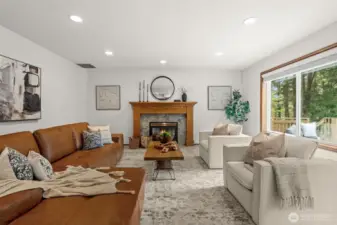 Kitchen opens to family room and cozy gas fireplace.