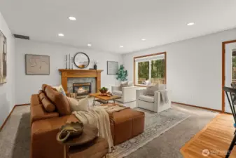 Kitchen opens to family room and cozy gas fireplace.