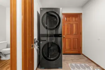 Laundry room leads to garage. Washer and dryer stay with the house.