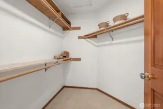 Primary bedroom large walk-in closet.