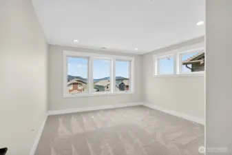 2nd level second bedroom with so much natural light with water views!