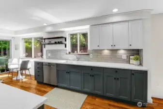 Dog door to backyard sits right behind kitchen breakfast nook table.
