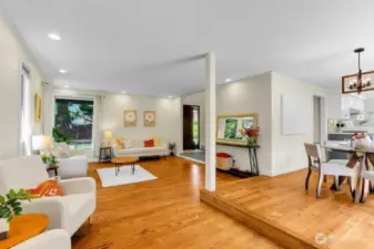 Entertainer's dream with a circular floor plan which provides easy flow from kitchen, dining, and living room!