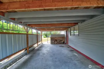 Carport has side access into family room.