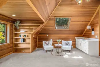 Bonus space off the master with fireplace and sink—ideal for a lounge, office, or nursery.