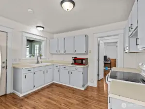 A simple epoxy coating to the counters would transform this space for even the tightest budget.
