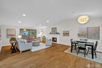 Huge great room fashion around a beautiful gas fireplace.