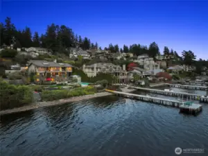 Set on an expansive 31,714 sq. ft. (.728 acre) estate on Kirkland’s coveted Juanita Point, the property comprises an 18,025 sq. ft. primary lot with 80 feet of waterfront and an additional 13,689 sq. ft. adjoining vacant waterfront lot with 81 feet of shoreline