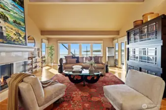 . Approximately 5,030 square feet of refined living space includes 5 bedrooms and 4.5 baths, cathedral ceilings, transom windows, hardwood floors, and walls of glass that invite warm natural light and frame the exceptional vistas from nearly every room.