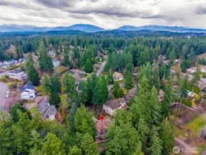 Aerial view of Lake Forest Estates showcasing proximity to Lake Wilderness, Trail, and central Maple Valley amenities.