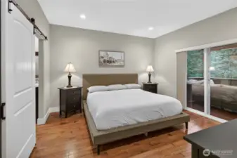 Primary bedroom with direct porch access.