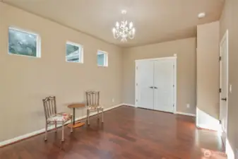 Downstairs bedroom with walk in closet and attached 3/4 bath