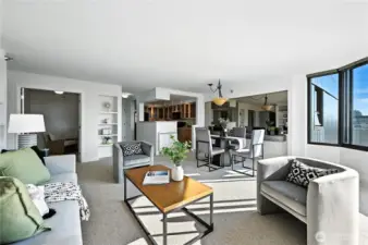 Another view of the gracious living, dining & kitchen plus the awesome den space with glass French doors.