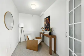 Check out this redesigned storage area to a new den space with glass French doors!