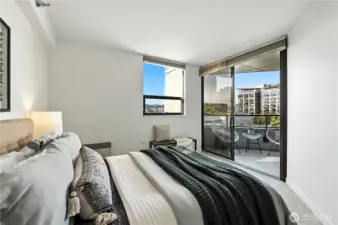 Nice guest bedroom also leads to the deck with views of the Space Needle!