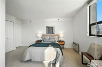 Guest bedroom is spacious & comfortable with a nice size closet & plenty of natural light from the deck & north window.