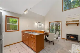 Fir cabinetry and open-concept living spaces reflect timeless craftsmanship while also inviting family and friends to gather, cook, laugh, and connect.