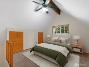Upstairs, a spacious loft suite serves as a true retreat, complete with dual closets and lofty views over treetops and the lake—a serene setting to wake up in, or the perfect vantage point for stargazing at night. [Photo is virtually staged]