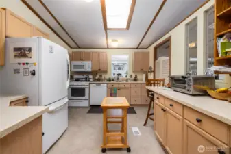 Large kitchen with plenty of storage and natural light.
