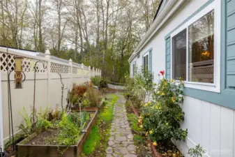 Side yard with garden area.