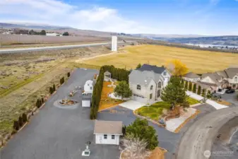 Golf cart garage, Hobby shed, and great view of back area for additions or RV