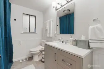 The main bathroom is easily accessible from the living room and main floor bedrooms.