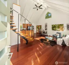 The great room is spacious and light-filled. Bamboo floors and fresh paint.